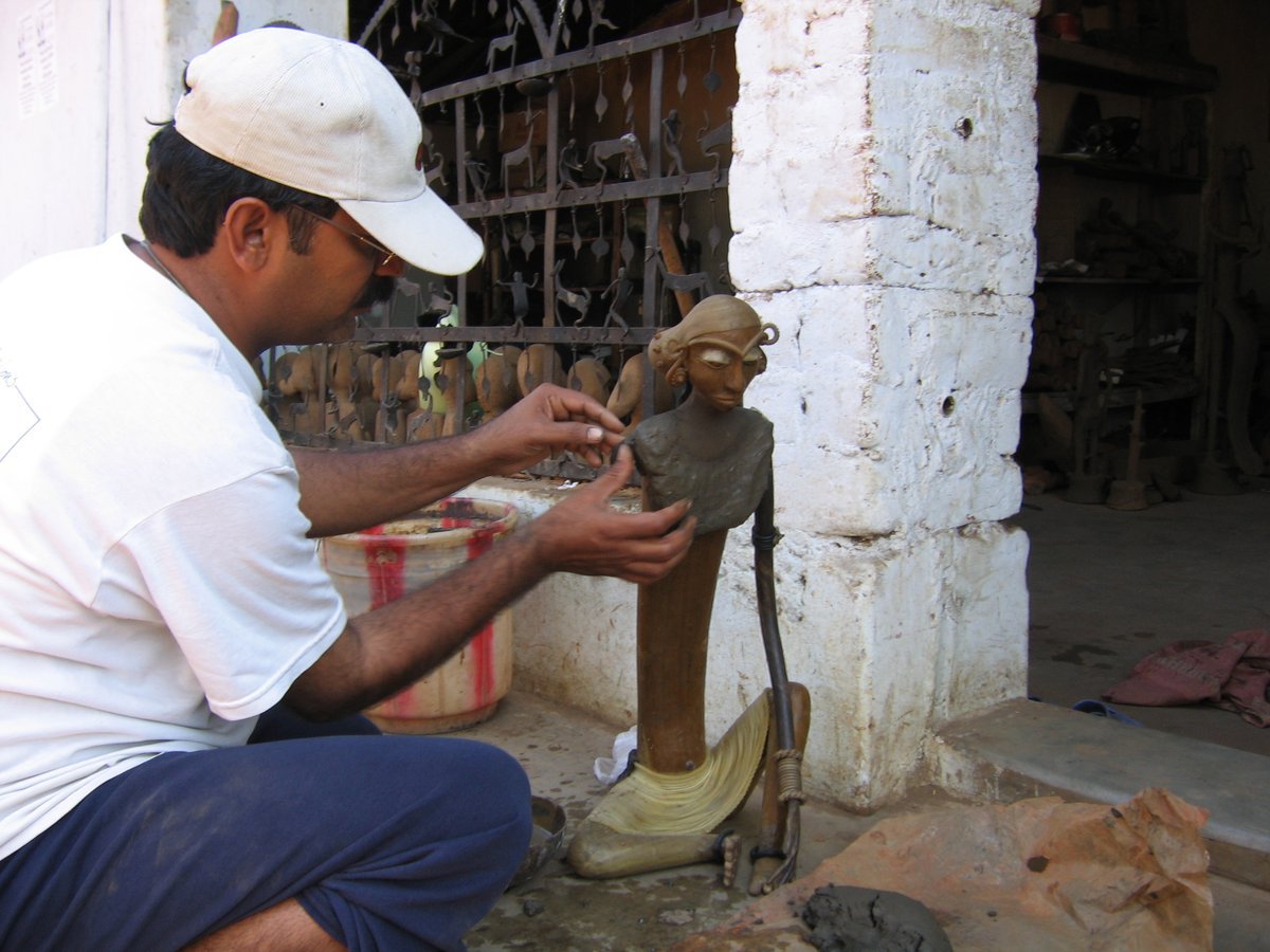 Tribal Metal Sculptor Rameshwar Baghel at work in Bastar